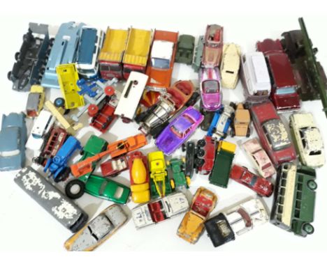 A mixed lot of play worn Corgi, Dinky, Matchbox and other diecast model vehicles. 