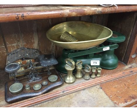 Two pairs of scales, some weights and cigarette chalet 