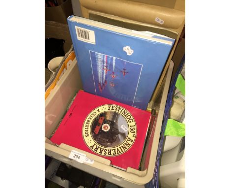 A box of books and some steam engine sketches 