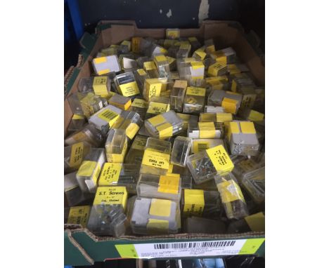 A box of vintage car fuses and screws 