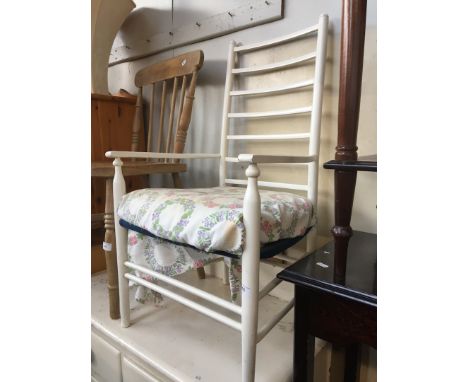 A retro white painted ladder back armchair. 