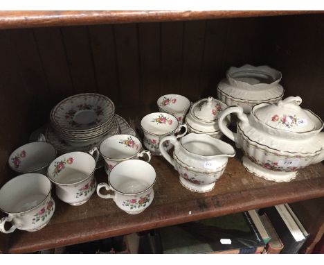 Shelf of Royal Stafford china 