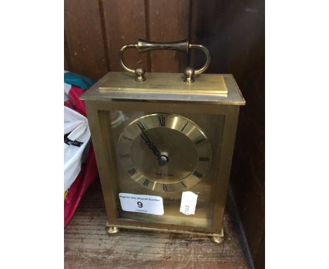 A brass carriage clock 