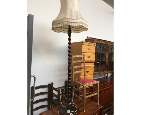 A bobbin turned standard lamp 