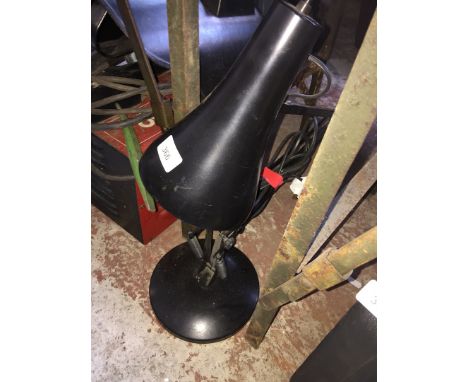 An Anglepoise lamp 