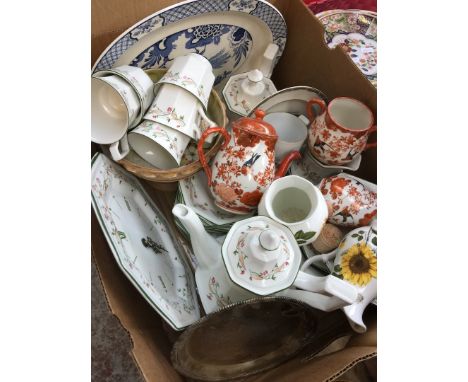 A box containing a tea set, ceramic clock, a bowl, etc 