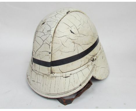 A 1930's dated fire chief officer fireman's helmet by Hendry of Glasgow