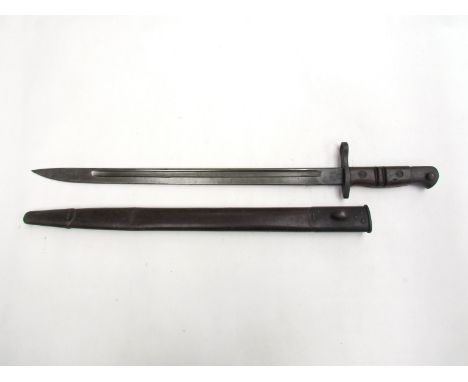 A WWI 1913 pattern (P13) bayonet by Remington, dated 5 16, with a 1907 Mk. II later variant scabbard