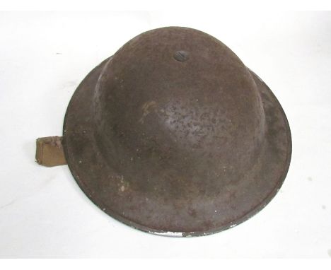 A British Army helmet with "rubber ring" liner 