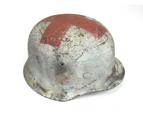 A WWII German design double decal Medic's style helmet, later liner. Buyer to determine age.