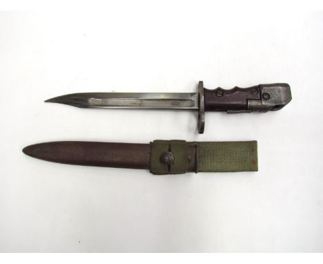 A British No. 7 bayonet dated 1948, with black painted steel scabbard and webbing frog