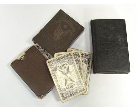 A pack of WWII American issue playing cards together with a soldier's bible