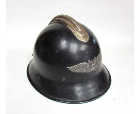 A WWII German Luftwaffe helmet with liner and chin strap