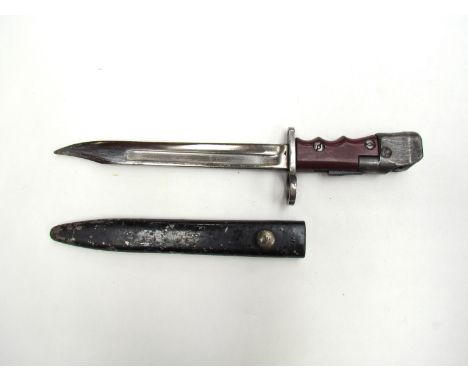 A British No. 7 Mk. I/L knife bayonet for the No. 4 rifle / Sten Mk 5 sub machine gun, with black painted scabbard