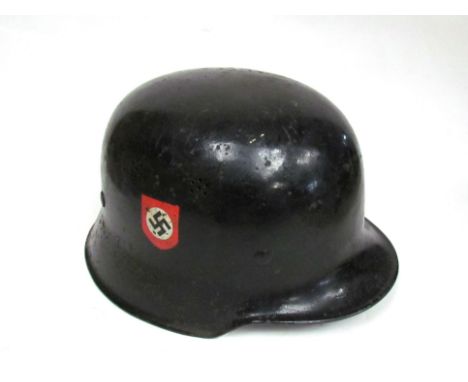 A German WWII double decal Police helmet with liner and chin strap