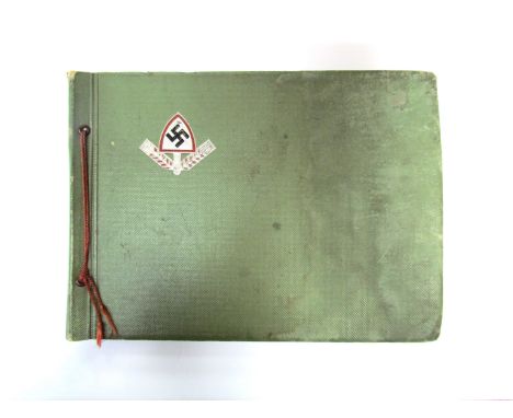 A WWII German army and RAD photo album with 160 photos, some captioned including action photos 