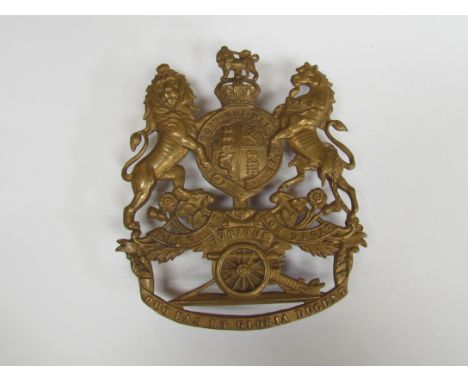 A Royal Artillery brass helmet badge