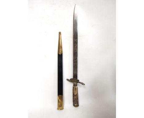 An Imperial style German hunting dagger bearing Hubertus, Solingen mark.  The antler grip set with crossed rifles badge, horn