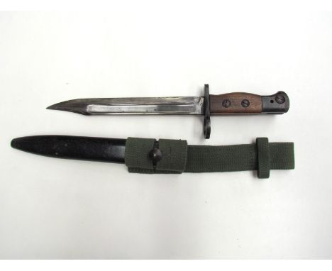 A No. 5 Mk. I bayonet for the Jungle Carbine with Bowie form blade by WSC, with steel scabbard and webbing frog