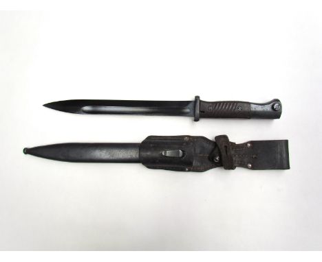 A WWII German K98 bayonet, dated '42, with painted steel scabbard and leather frog 