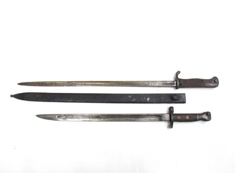 A British 1907 pattern bayonet (no scabbard), together with an 1898 pattern Mauser bayonet with scabbard, both pitted (2)