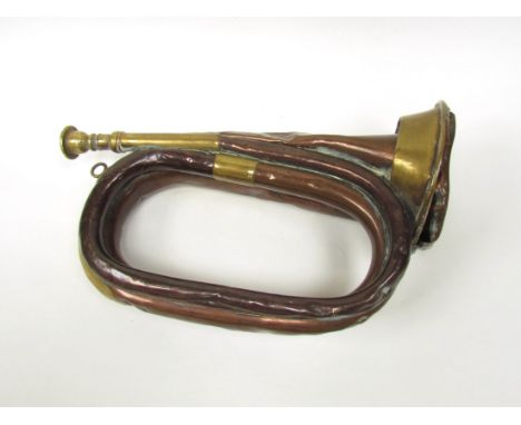 A WWI 1917 dated bugle in excavated relic condition, reputedly found on the Ypres battlefield