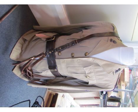 A WWII British Army jacket and trousers dated 1939, by Johnstone, together with Sam Browne 
