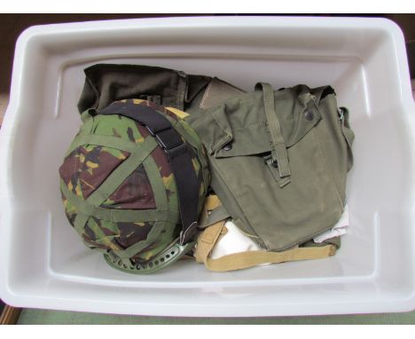 A box of webbing etc including a camouflage helmet