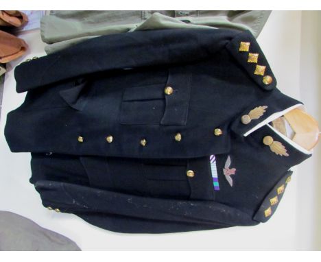 A post-war British Army dress jacket and trousers with King's Crown buttons and DFC bar 