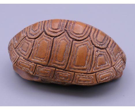 A 19th century netsuke formed as a tortoise shell.  5.5 x 4 cm.