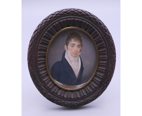 A Georgian portrait miniature, in oval frame.  Frame 10 cm x 9 cm.  