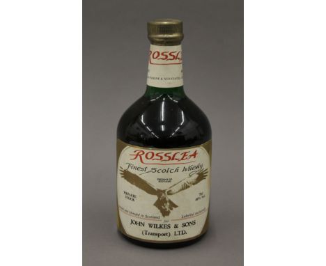 A bottle of Rosslea Finest Scotch Whisky.