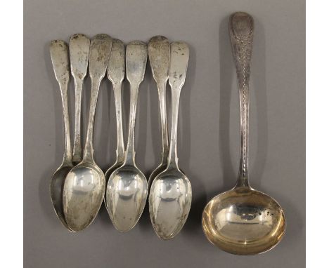 A Victorian silver ladle and a quantity of silver teaspoons. 218.7 grammes.