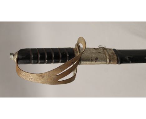 A sword in scabbard. 90 cm long.