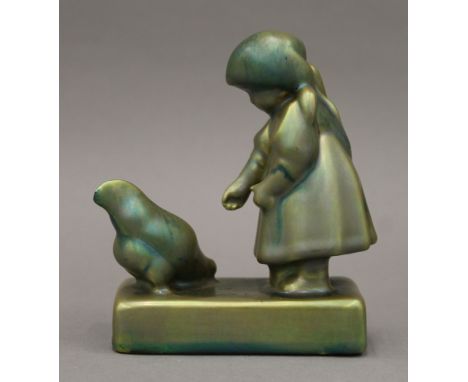 A Zsolnay Pecs lustre porcelain figure. 10.5 cm high.