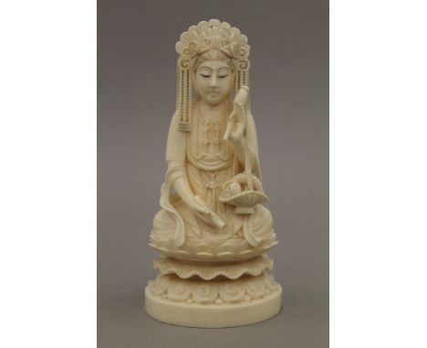 A late 19th century Chinese carved ivory model of Buddha, the underside with seal mark. 15.5 cm high.