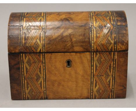 A Victorian inlaid walnut dome topped tea caddy. 20 cm wide.