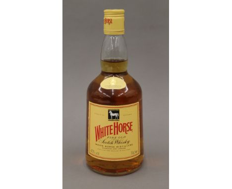 A bottle of White Horse Fine Old Scotch Whisky.