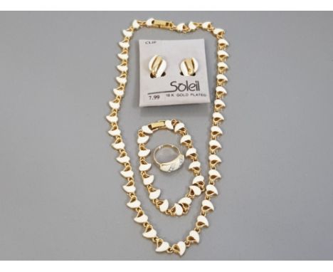 4 PIECE SOLEIL SET INCLUDES GOLD PLATED AND CREAMY ENAMEL NECKLET, RING, BRACELET AND EARRINGS
