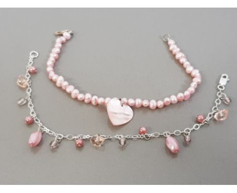 PINK FRESHWATER PEARL AND MOTHER OF PEARL HEART BRACELET TOGETHER WITH A SILVER AND PEARL BEADED BRACELET