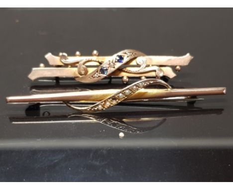 TWO 9CT VICTORIAN BROOCHES ONE WITH BLUE STONE AND SEED PEARL STAMPED 375 THE OTHER SEED PEARL (ONE PEARL DETACHED BUT PRESEN