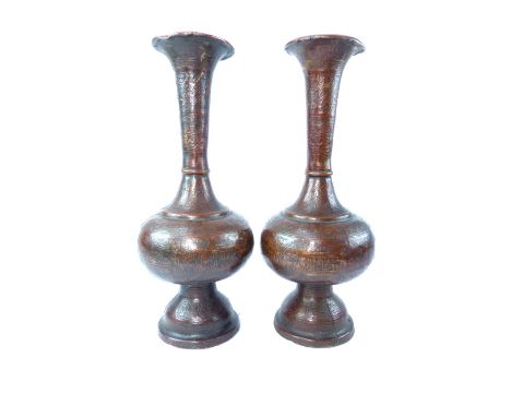 Pair of Persian copper vases converted as table lamps, decorated with script panels and foliage, 33cm h, (2)