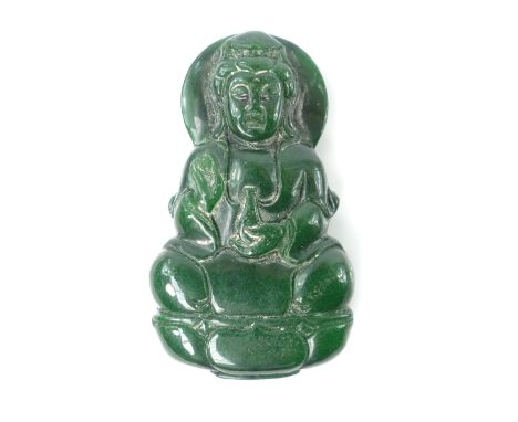 Chinese spinach jade large pendant of Guanyin holding a vase, seated on a lotus petal pad, 7.1cm h