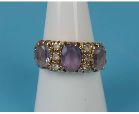 Edwardian 9ct gold three stone amethyst and white stones ring