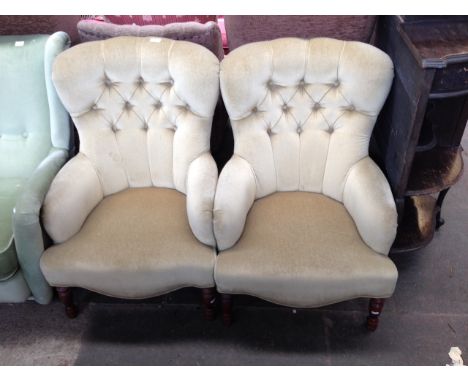 PAIR BUTTON BACK ARMCHAIRS