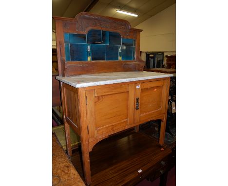 A late Victorian beech white marble topped and tile inset double door wash stand, width 92cm