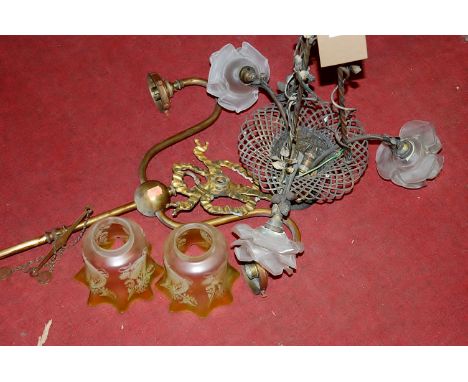A brass and metal three light ceiling pendant; and one other incomplete pendant with two glass shades (2) 