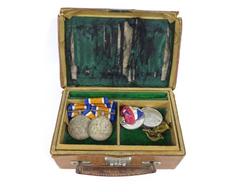 A group of militaria, including two sets of WWI medals, one group named Second Lieutenant R. S. Ernst, an Indian Service meda