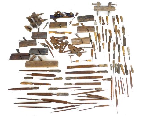 A quantity of vintage hand tools, including planes, files, chisels, and screwdrivers. (1 box) 