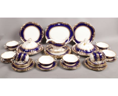 A Spode Lancaster blue six place dinner service.Condition report intended as a guide only.Sauceboat stand broken in to and re